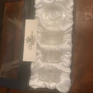 Napkin rings, 4 rings in box, new in a box.
